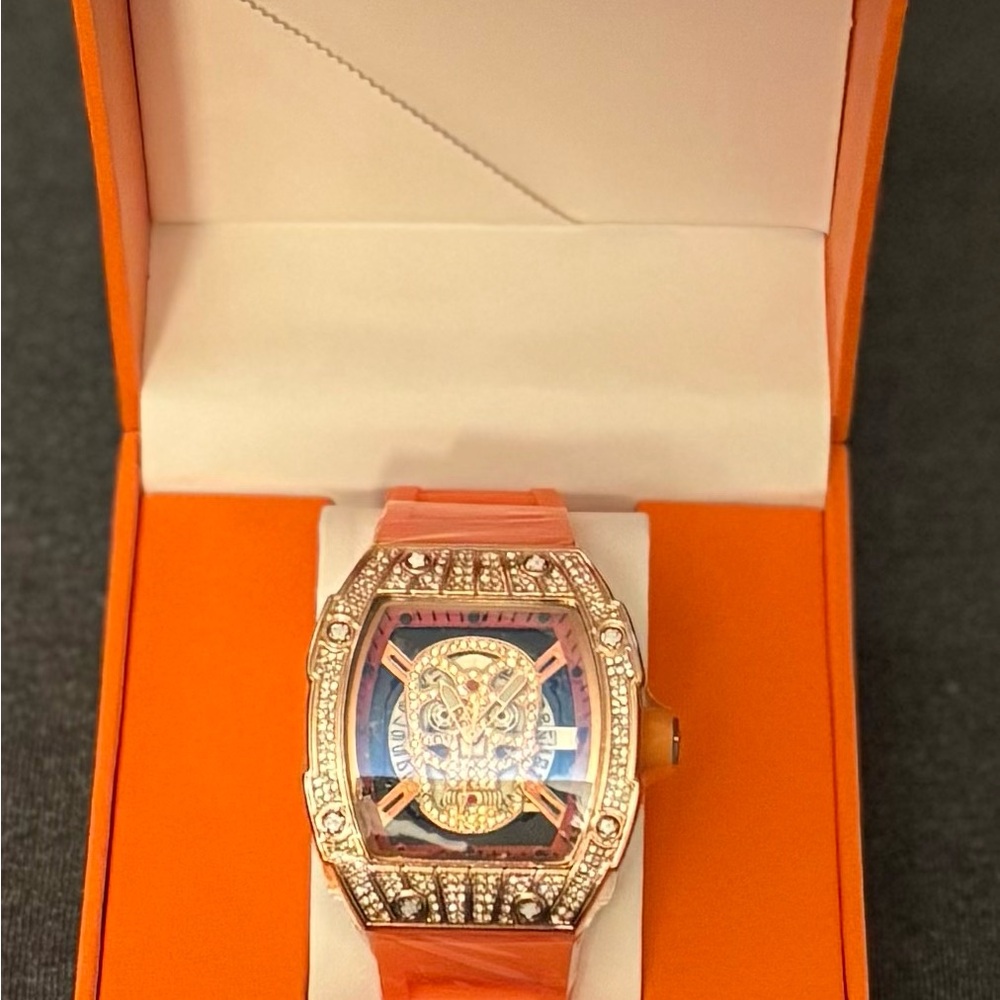 💀 Iced Skull Luxury Watch – Rose Gold Tone Crystal Bezel w/ Orange Strap